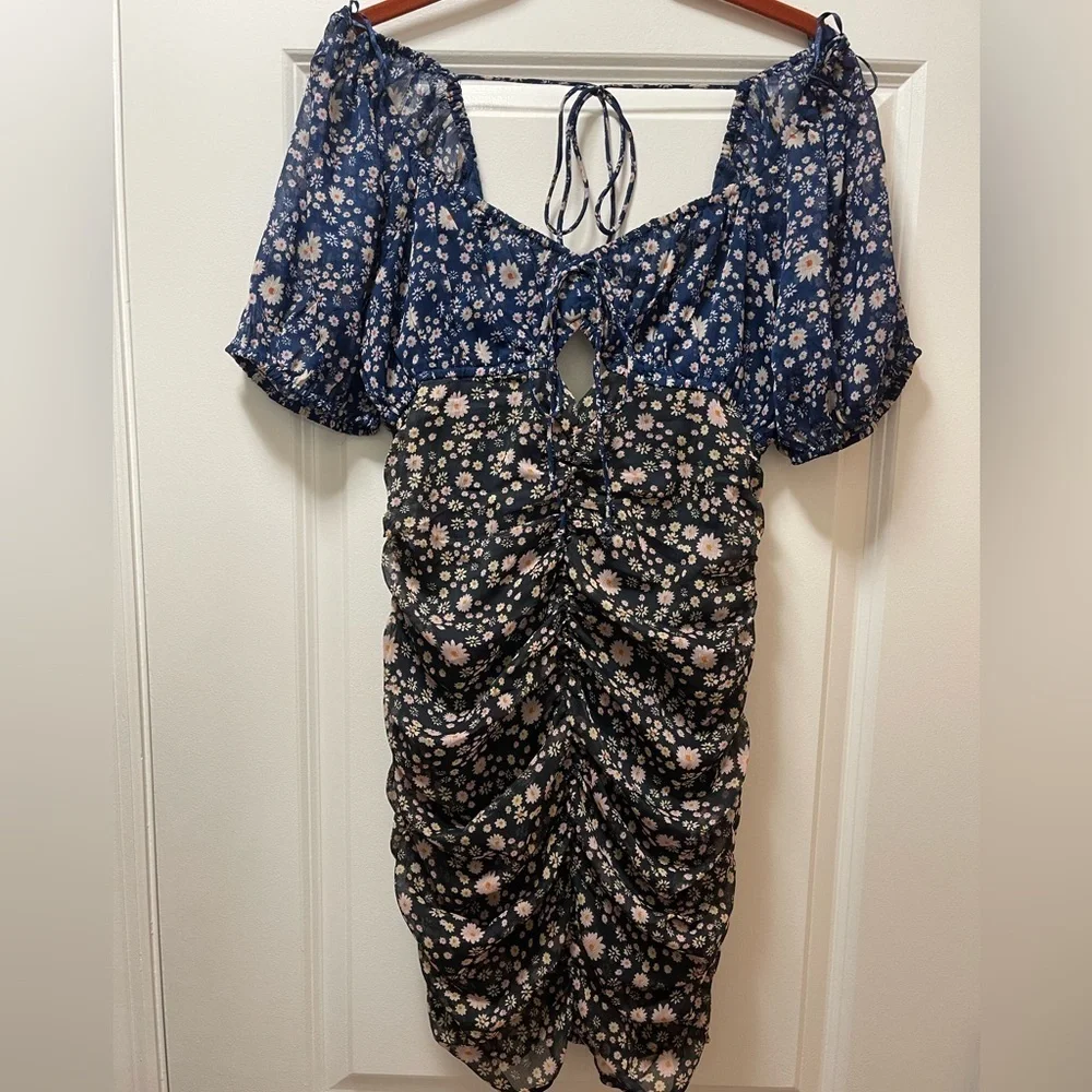 NWOT  Free People Tessa Dress. Size Small. Color is Night Combo